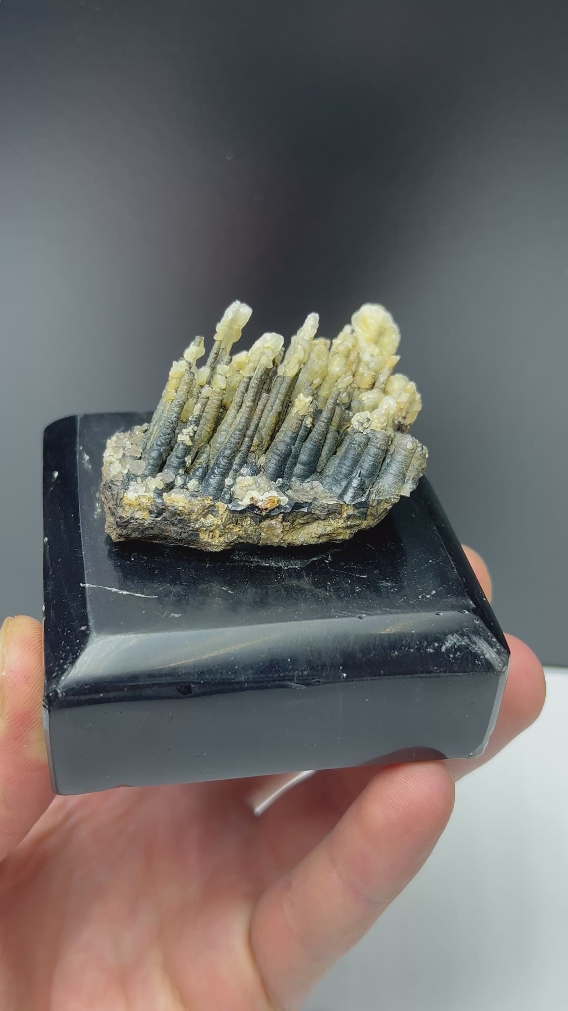 Calcite With Stalactite Goethite On Obsidian Stand